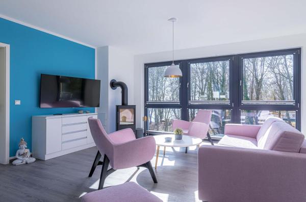 På bildet vises objektet Apartment Schleiereule am See mit Sauna und Kamin som ligger i byen Möllen.