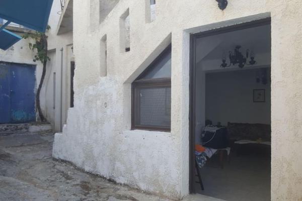 På billedet ses objektet Traditional Melabes Inn beliggende i byen Orné.