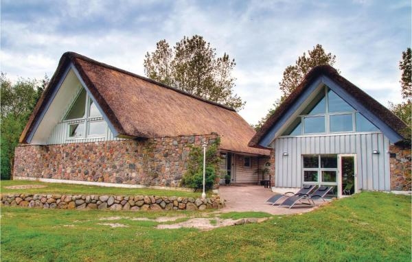 A la foto es mostra l'objecte Four-Bedroom Holiday Home With A Fireplace In Rømø situat a la ciutat de Toftum.