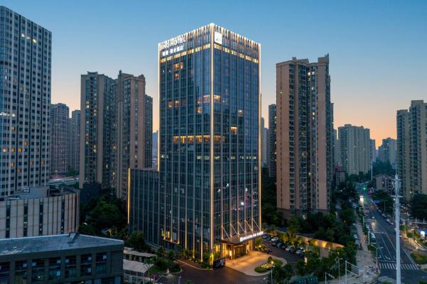 A la foto es mostra l'objecte Qinglian Jinghe Hotel Wuhan Zoo International Expo Center Branch situat a la ciutat de Hanyang.