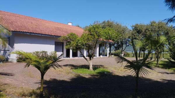 A la foto es mostra l'objecte Sítio em Torres com Piscina e vista para Lagoa da Itapeva - Sítio Éden situat a la ciutat de Torres.