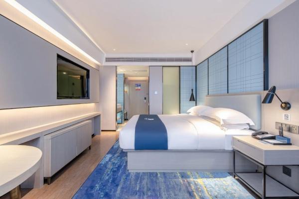 Na foto é possível ver o objeto Echarm Hotel Wuzhou Wangcheng Plaza Longmu Temple Sanzongfu Branch localizado na cidade de Wuzhou.