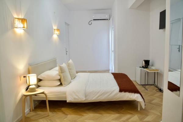 A la foto es mostra l'objecte Tzatziki Boutique Rooms situat a la ciutat de Kavala.