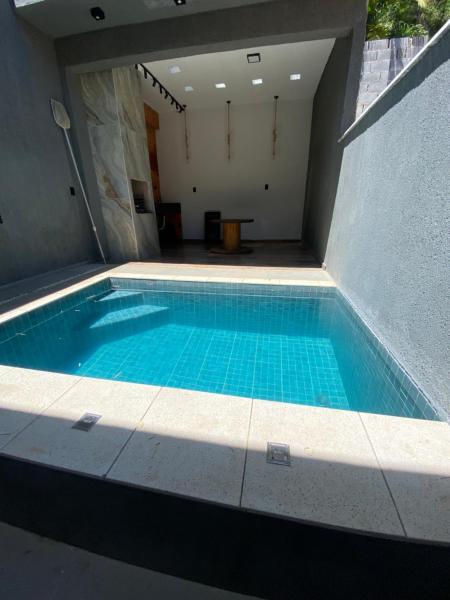 A la foto es mostra l'objecte Casa aconchegante com piscina situat a la ciutat de Parati.