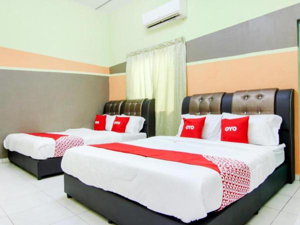 На фото показан объект OYO 89684 Mawaddah Inn Stay, расположенный в городе Tangkak.