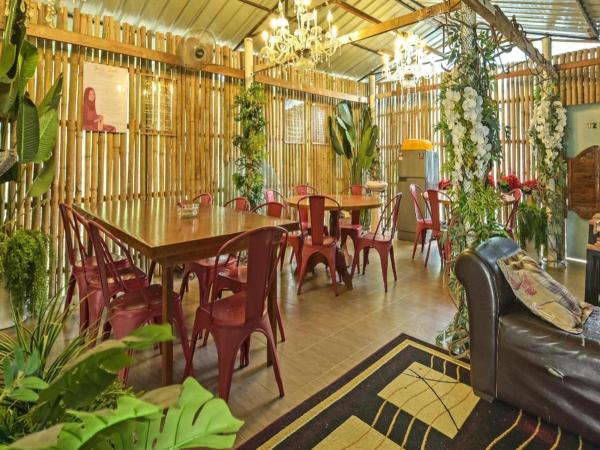 A la foto es mostra l'objecte OYO 90636 Teratak Zakiah Chalet situat a la ciutat de Jerantut.