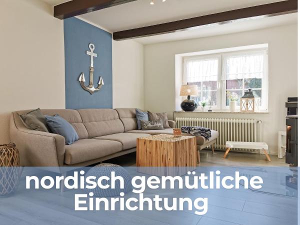Auf dem Foto ist das Objekt Smittshörn 3 - Nordsee Ferienhaus für Gruppen und Familien mit eingezäunten Garten in der Stadt Wittmund zu sehen.