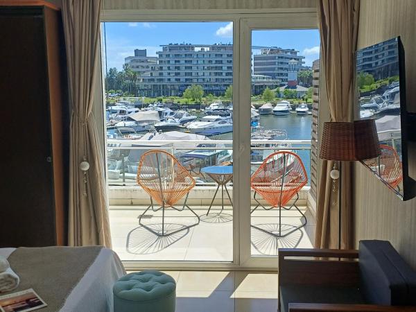 På billedet ses objektet Apart , Departamento condominio en Bahia grande Nordelta con balcon y vista a la bahia , piscina exterior opcional arancelada beliggende i byen Tigre.