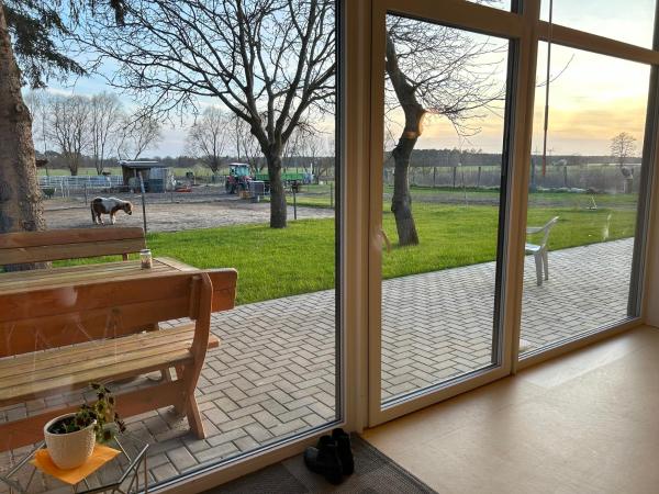 På bilden syns objektet Dorfstraße 32a - sieben ruhige Zimmer som ligger i staden Dunkelforth.