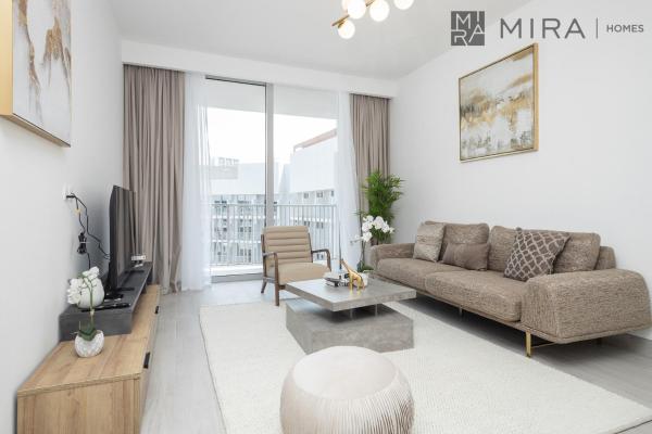 Na fotografii je vidět objekt Mira Holiday Homes - Luxury and cosy 1 bedroom in JVC nacházející se ve městě Dubaj.