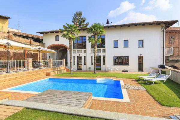Nella foto è visibile l'oggetto Villa Teresa - Enticing villa with pool and views! situato nella città di Palazzolo Vercellese.