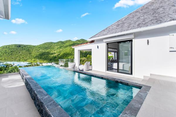 A la foto es mostra l'objecte Villa prestigieuse avec vue spectaculaire sur l Anse Marcel situat a la ciutat de Anse Marcel .