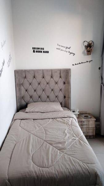 The photo shows the Elegant Sea View Cozy room with Private Balcony - Room inside Apartment located in the city of Ajman .