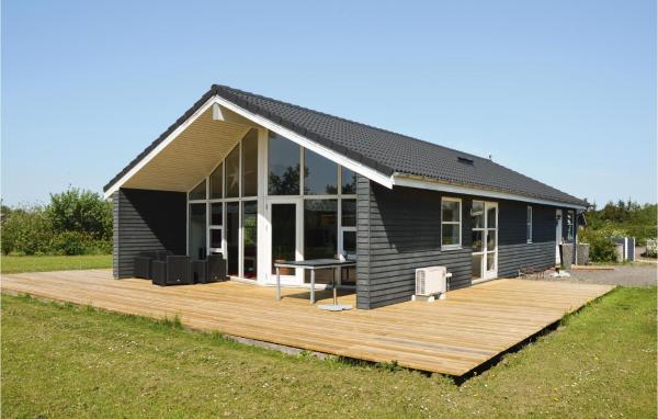 A la foto es mostra l'objecte Holiday Home Kornblomstvænget Hemmet Iii situat a la ciutat de Falen.