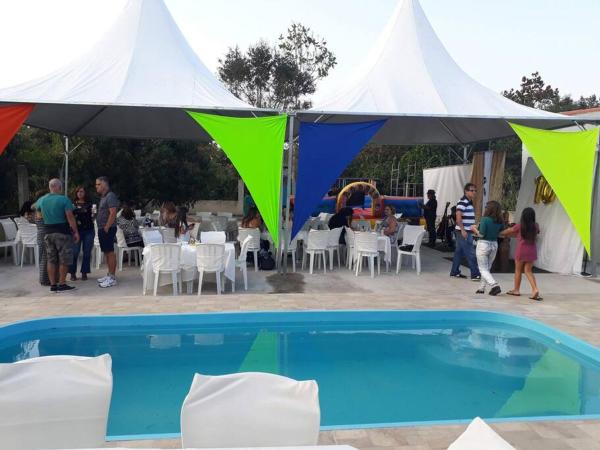 写真にはBarreto市にあるCasa em Itaipuaçu com Ar Piscina Churrasqueiraが写っています。
