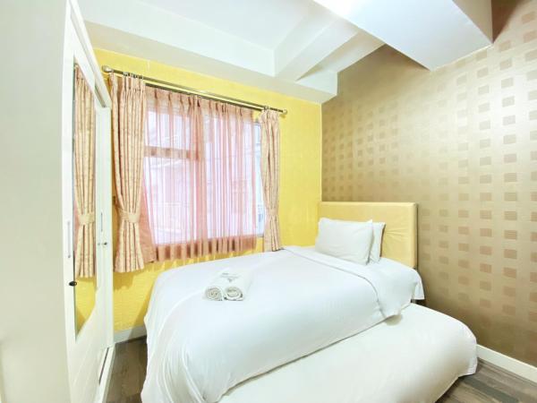 A la foto es mostra l'objecte Homey and Cozy 1BR Apartment at Harvard Jatinangor By Travelio situat a la ciutat de Sumedang.