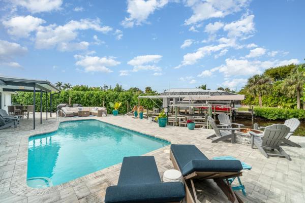 På bildet vises objektet Sailboat access - Under 15 min from Fort Myers Beach - Fire Pit and Heated Pool - Villa Canalview Cove som ligger i byen Iona.