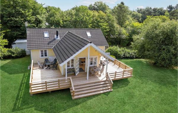 Nella foto è visibile l'oggetto Three-Bedroom Holiday Home In Hojby situato nella città di Højby.