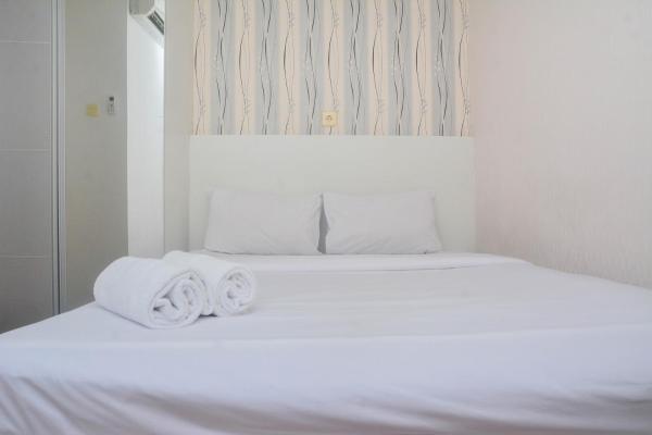 Minimalist And Warm 2br At Bassura City Apartment By Travelio - Depok