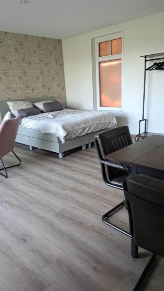 På billedet ses objektet B&B De Blauwe Melkbus beliggende i byen Harskamp.