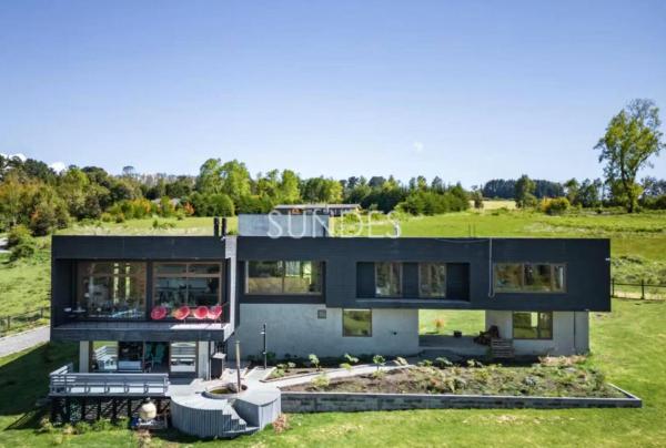 På bilden syns objektet Hermoso alojamiento con piscina y playa en Lago Panguipulli som ligger i staden Cozcoz.