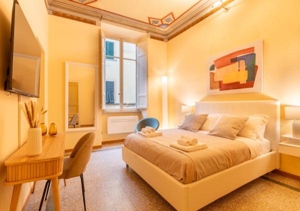 Auf dem Foto ist das Objekt Fil Rouge Apartment - Elegant Stay in Lucca Historic Center in der Stadt Lucca zu sehen.