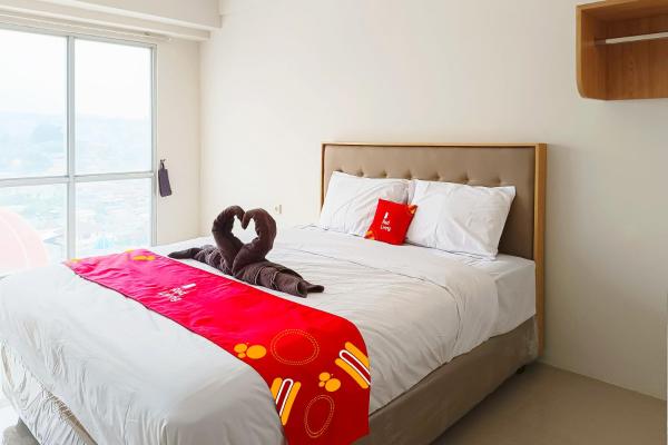 写真にはJomblang市にあるRedLiving Star Apartemen Semarang - UMAKU Lantai 16が写っています。