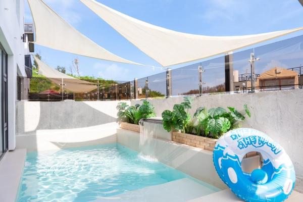 照片显示了位于Kyŏngp'o-mal市的Gangneung Pool Villa Sol物件。