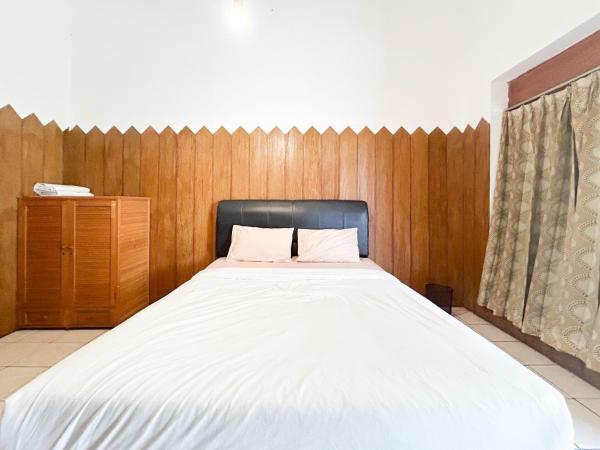 A la foto es mostra l'objecte RedDoorz at Makuta Guest House Prawirotaman Yogyakarta situat a la ciutat de Timuran.