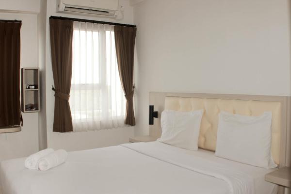 A la foto es mostra l'objecte Homey and Cozy Studio Apartment at Elvis Tower By Travelio situat a la ciutat de Cikarang.