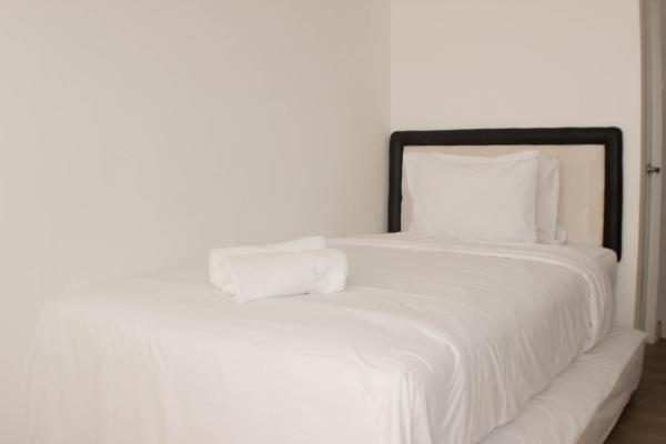 写真にはRawasuren市にあるComfy and Tidy Studio at Riverview Jababeka Apartment By Travelioが写っています。