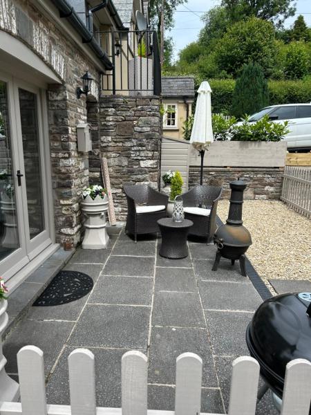 A la foto es mostra l'objecte Cosy riverside property situat a la ciutat de Devynock.