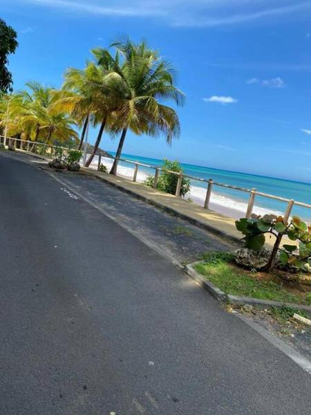 A la foto es mostra l'objecte Sérénité en Bord de Mer situat a la ciutat de Deshaies.