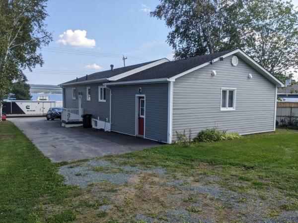 La photo montre l'objet Springhouse Cozy Oceanview 1-Bedroom Apartment situé dans la ville de Botwood.