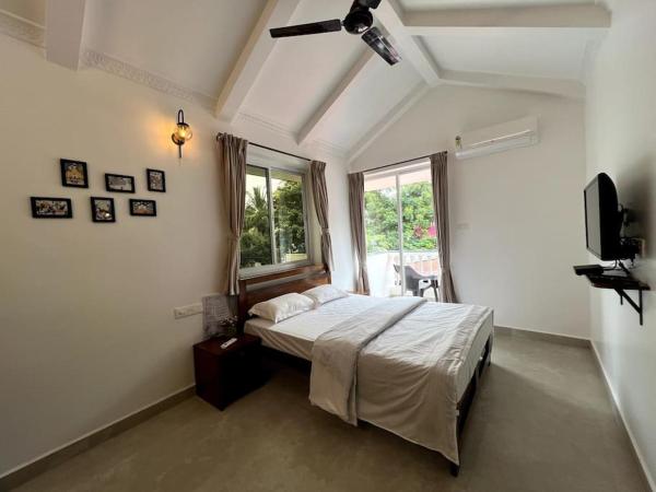 A la foto es mostra l'objecte AC Studio Apartment 500m from Cavelossim Beach-Paz situat a la ciutat de Mobor Goa.