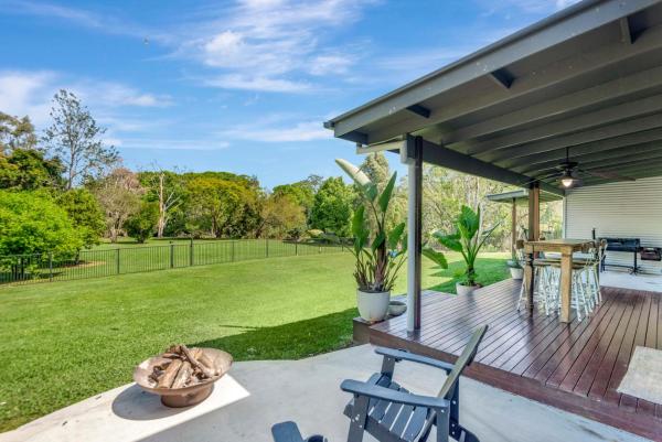 The photo shows the Lumeah by the Creek located in the city of The Channon.