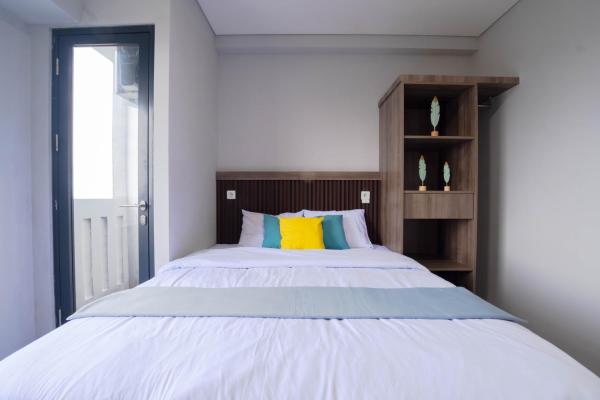 写真にはRawasuren市にあるApartemen Riverdale Cikarang By Abdihomeが写っています。