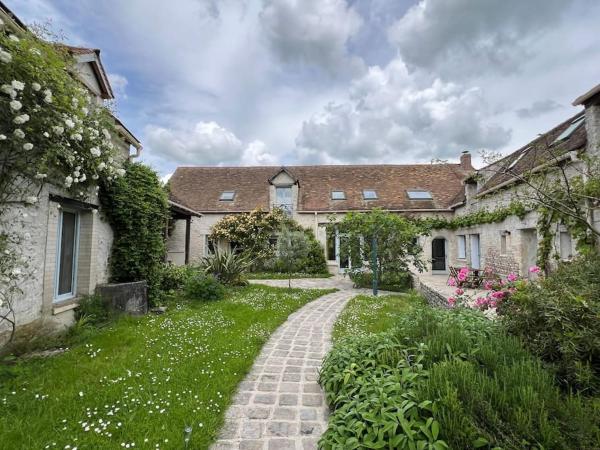 På billedet ses objektet Happy House - 1h30 de Paris beliggende i byen Courcelles.