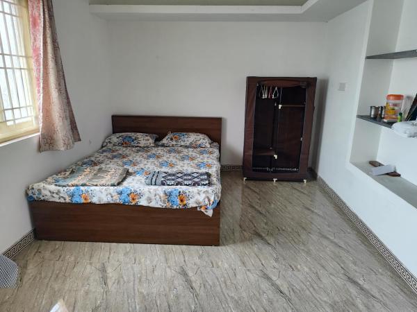 Na zdjęciu widoczny jest obiekt MMVK Homestay AC, Spacious & Comfortable Entire Home Just For You położony w mieście Pollachi.