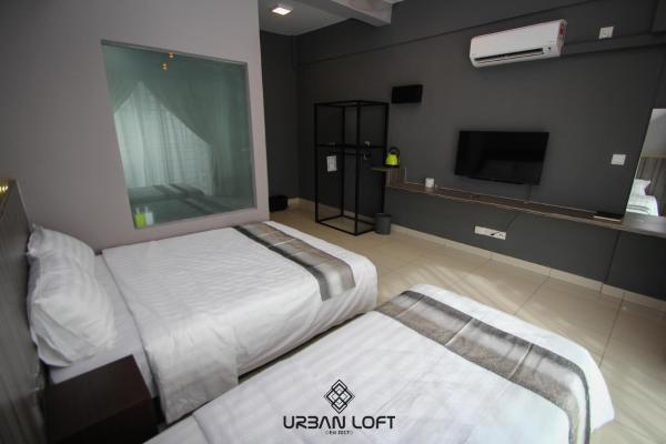 Na foto é possível ver o objeto Urban Loft 17 localizado na cidade de Tanjong Aru.