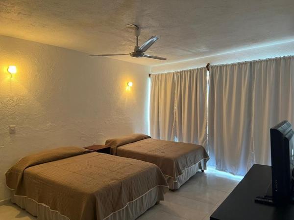 A la foto es mostra l'objecte Habitación 18 a unos pasos de la playa Las Brisas situat a la ciutat de Manzanillo.