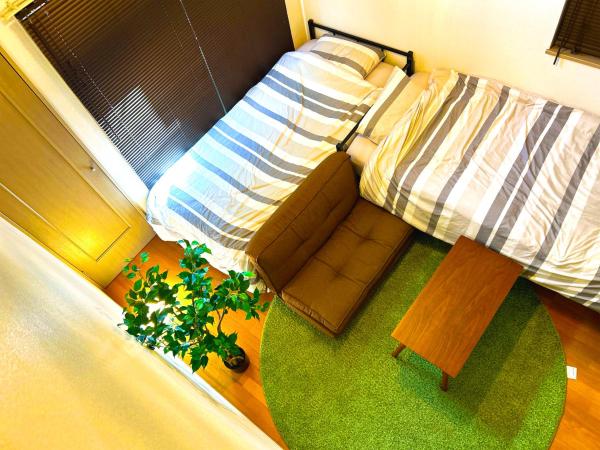 A la foto es mostra l'objecte 竹下 inn, Near the airport situat a la ciutat de Itazuke.