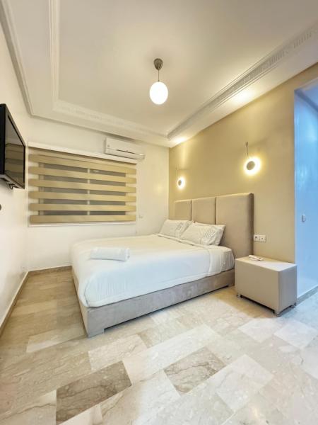 På billedet ses objektet SUITOUISS - Agdal 3 - Appartement à 2 minutes de la gare de train TGV Rabat beliggende i byen Rabat.