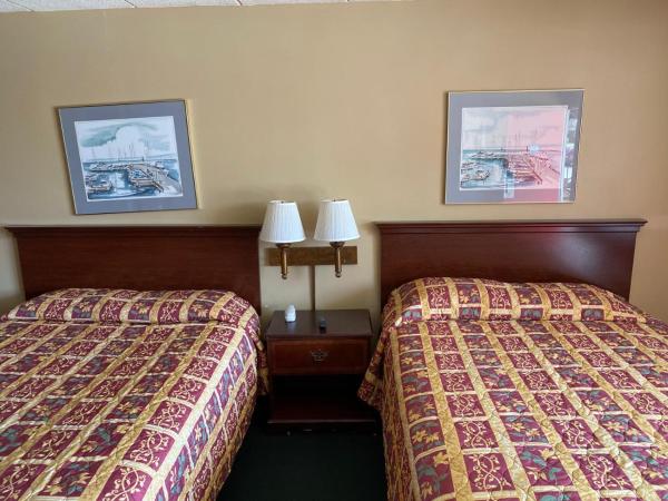 A la foto es mostra l'objecte Budget Host Village Inn situat a la ciutat de La Plata.