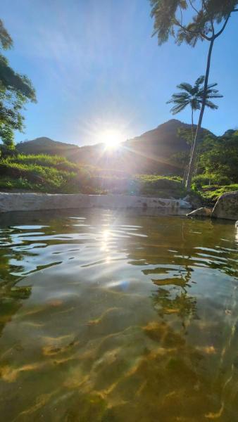 Na fotografii je vidět objekt Sítio com piscina natural Cachoeiras de Macacu nacházející se ve městě Imbau.