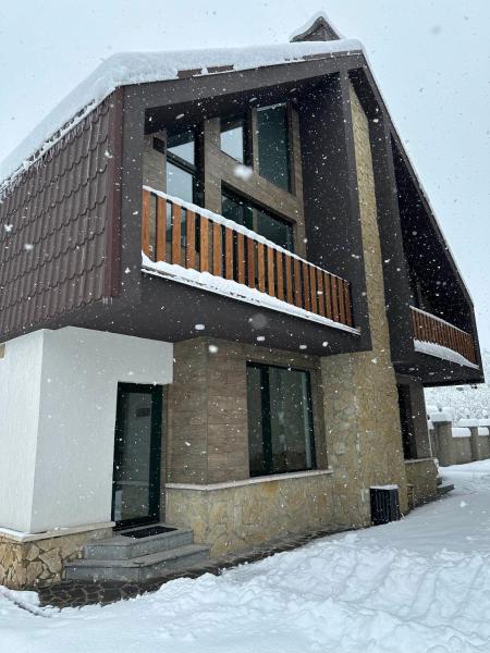 На фото показан объект Mount Cottages Bakuriani, расположенный в городе Бакуриани.