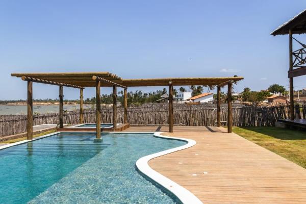Na foto é possível ver o objeto Vila Insular - Beira-mar - 3 casas p/ até 36 localizado na cidade de Cajueiro.