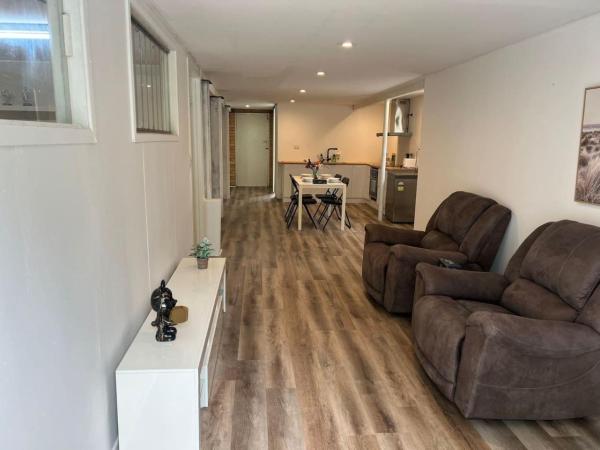 The photo shows the Cozy 2Beds Studio witch Kitchen Laundry near Zoo and Mall located in the city of Brookfield.