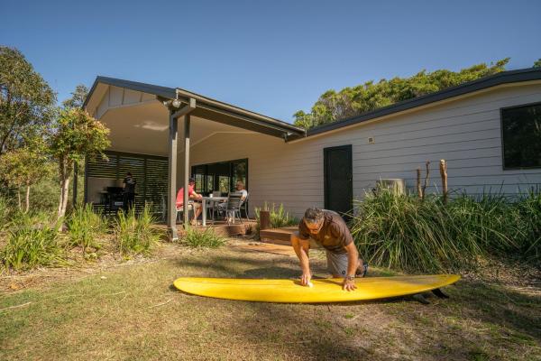 The photo shows the Plomer Beach House located in the city of Point Plomer .