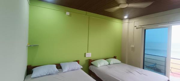 A la foto es mostra l'objecte Aisiri comforts beach stay and cafe situat a la ciutat de Gokarn.